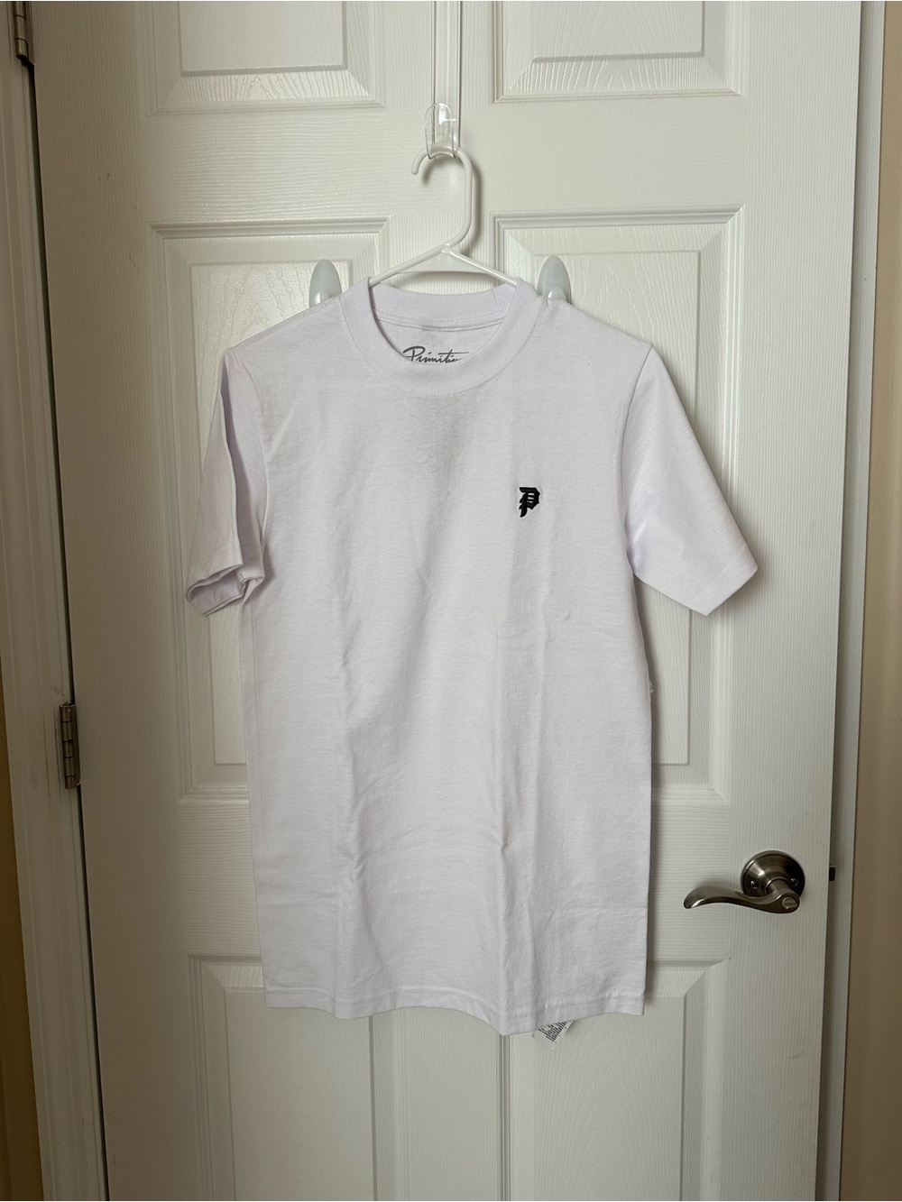 Primitive White Crewneck T-Shirt with Black Logo Tag